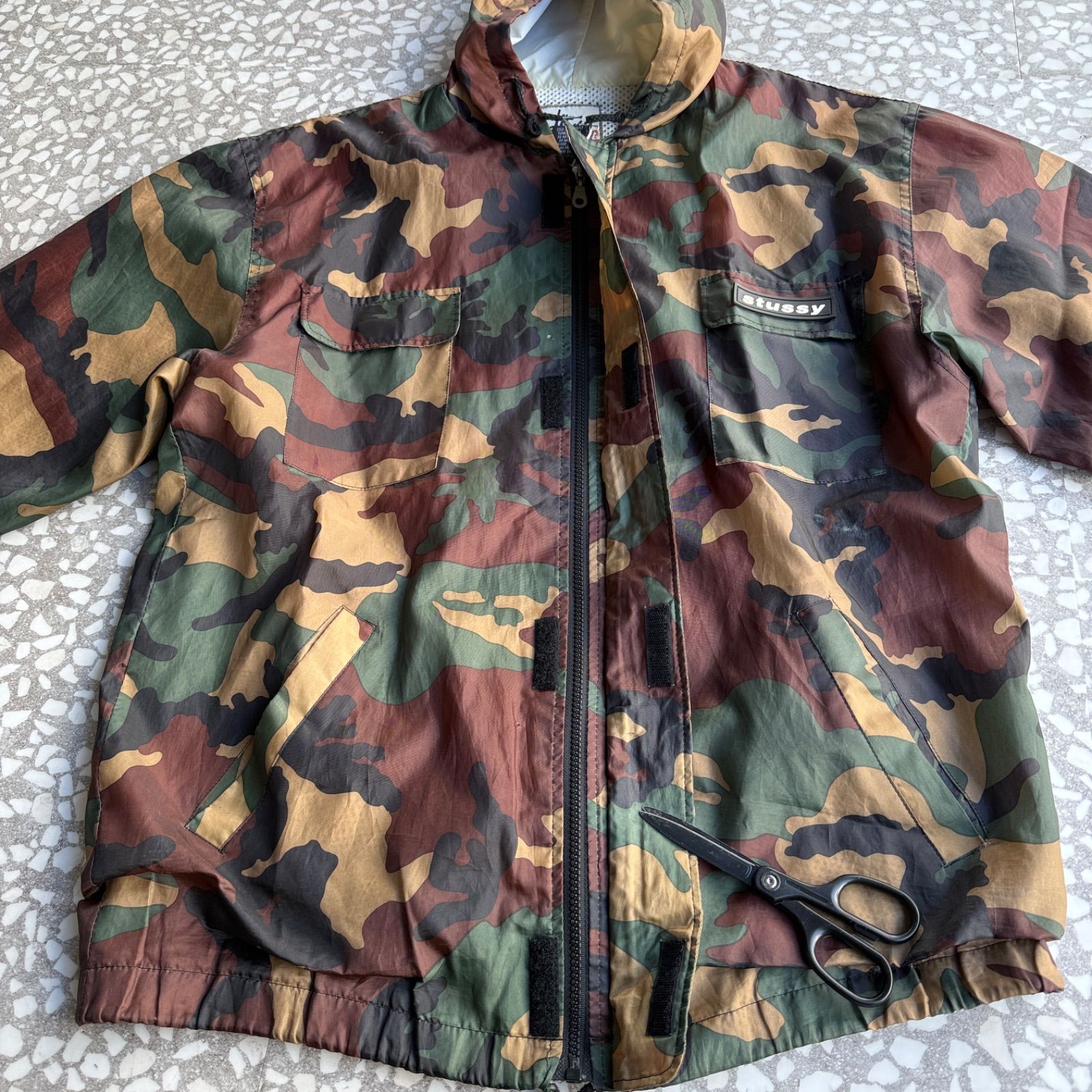 STUSSY / 90′s OUTDOOR nylon jacket オールドステューシー 総柄 迷彩