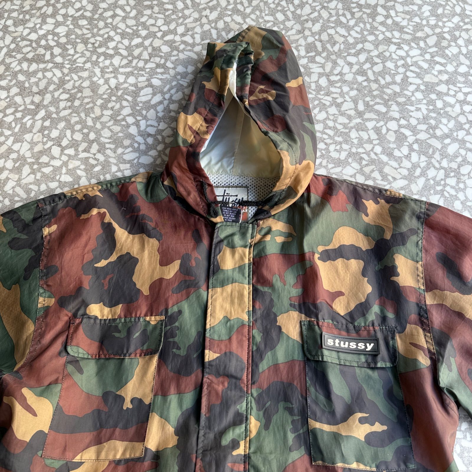 STUSSY / 90′s OUTDOOR nylon jacket オールドステューシー 総柄 迷彩