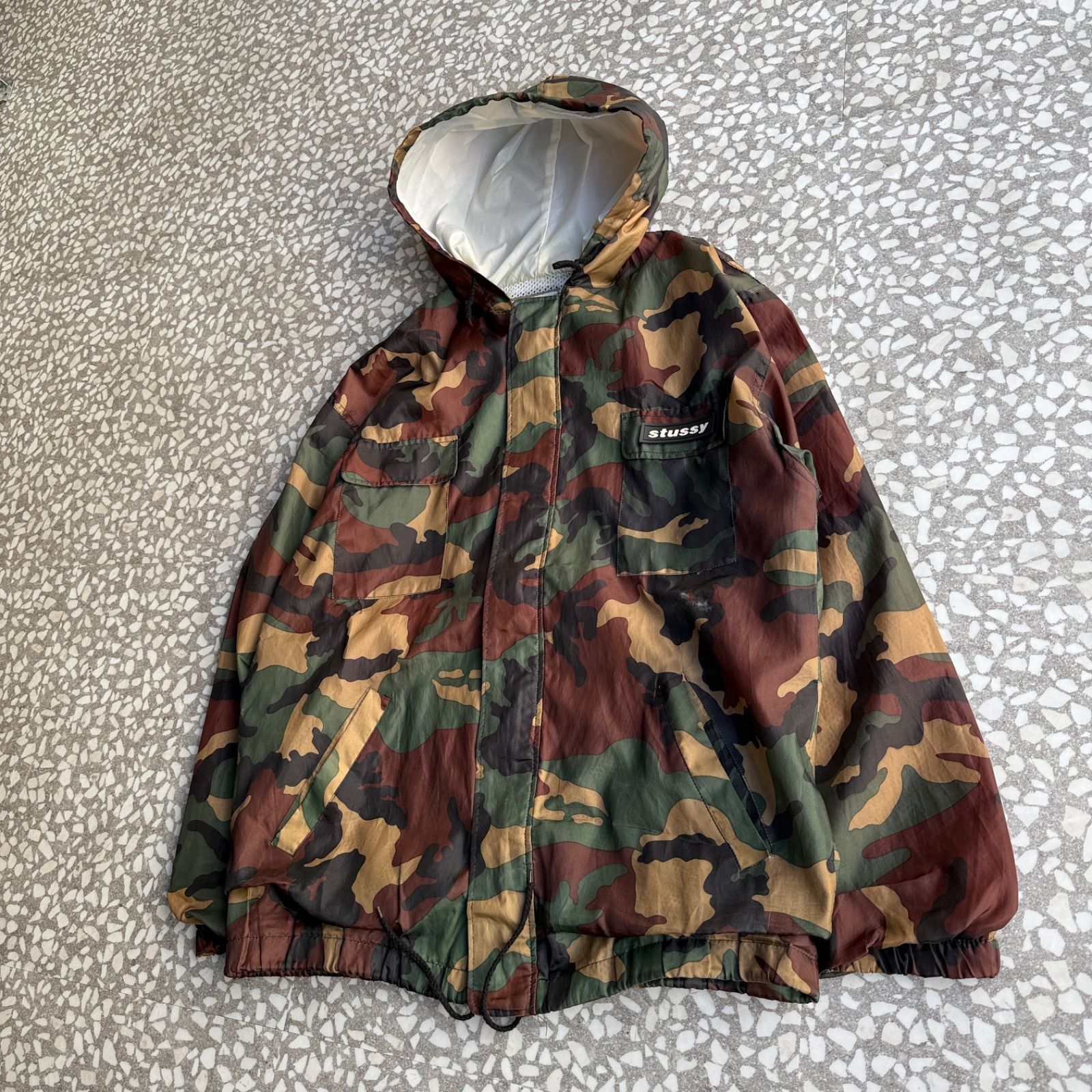 STUSSY / 90′s OUTDOOR nylon jacket オールドステューシー 総柄 迷彩