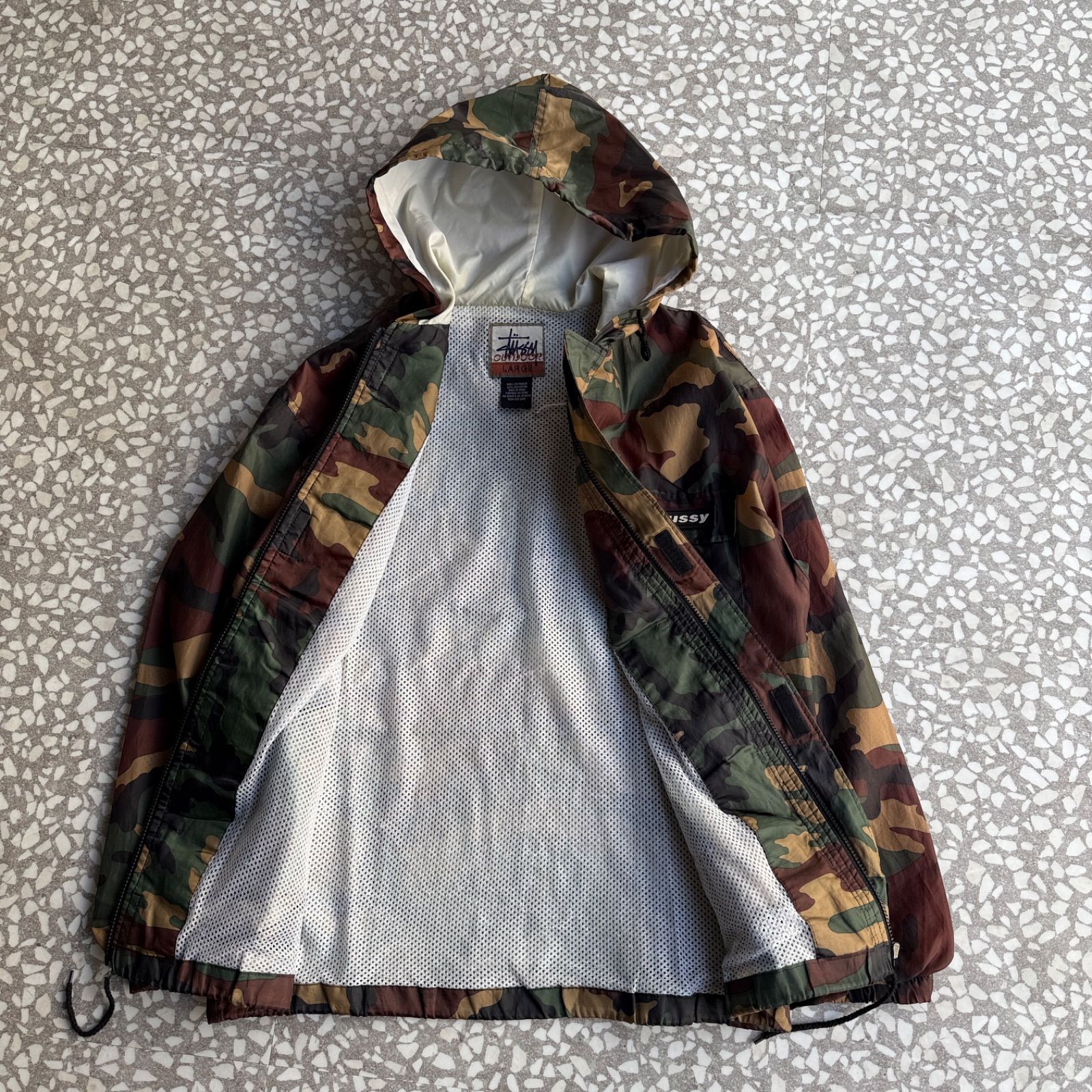 STUSSY / 90′s OUTDOOR nylon jacket オールドステューシー 総柄 迷彩