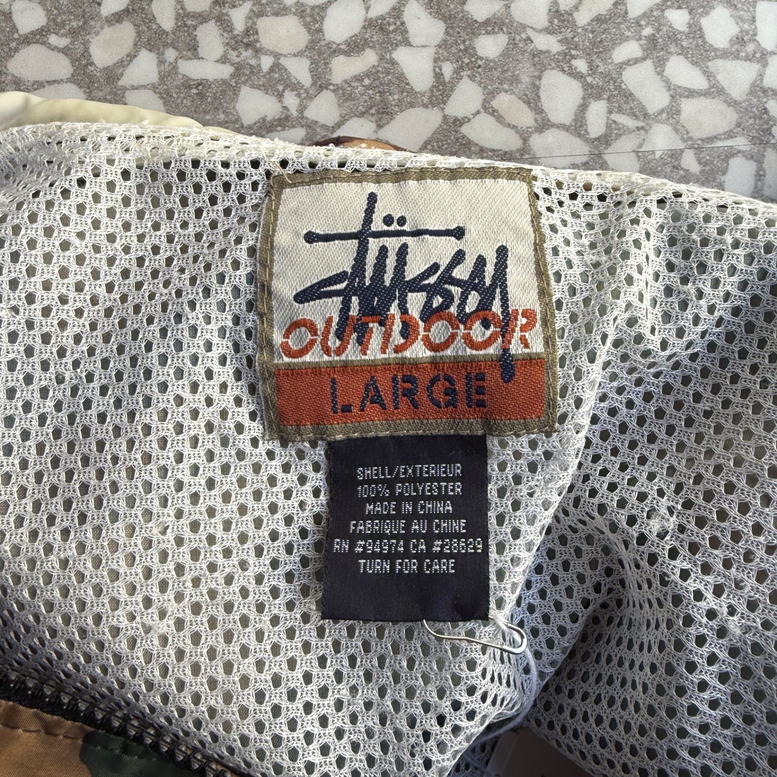 STUSSY / 90′s OUTDOOR nylon jacket オールドステューシー 総柄 迷彩 