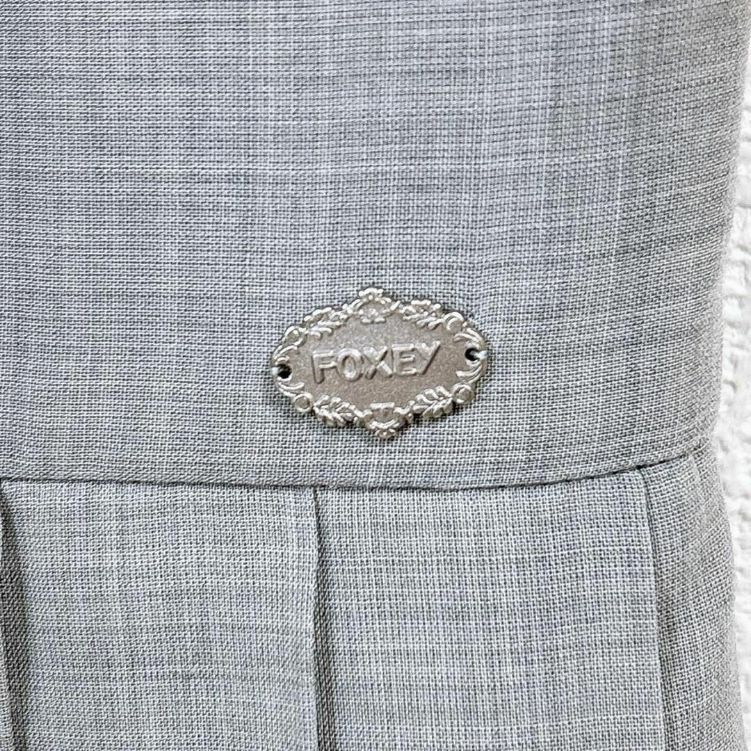 美品】FOXEY NEW YORK ノースリーブワンピース 38 無地 グレー - メルカリ