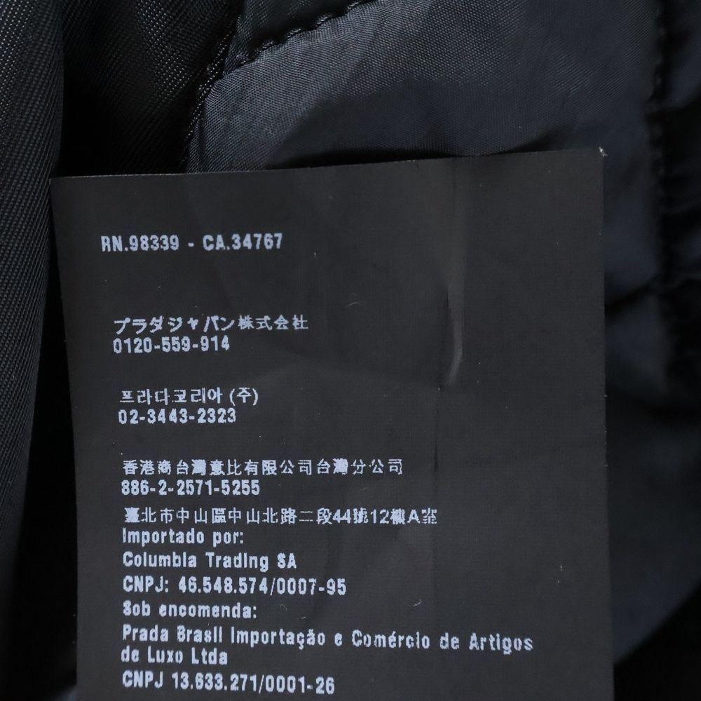 PRADA (プラダ) 中綿入りパテッド比翼ボタンステンカラーコート  