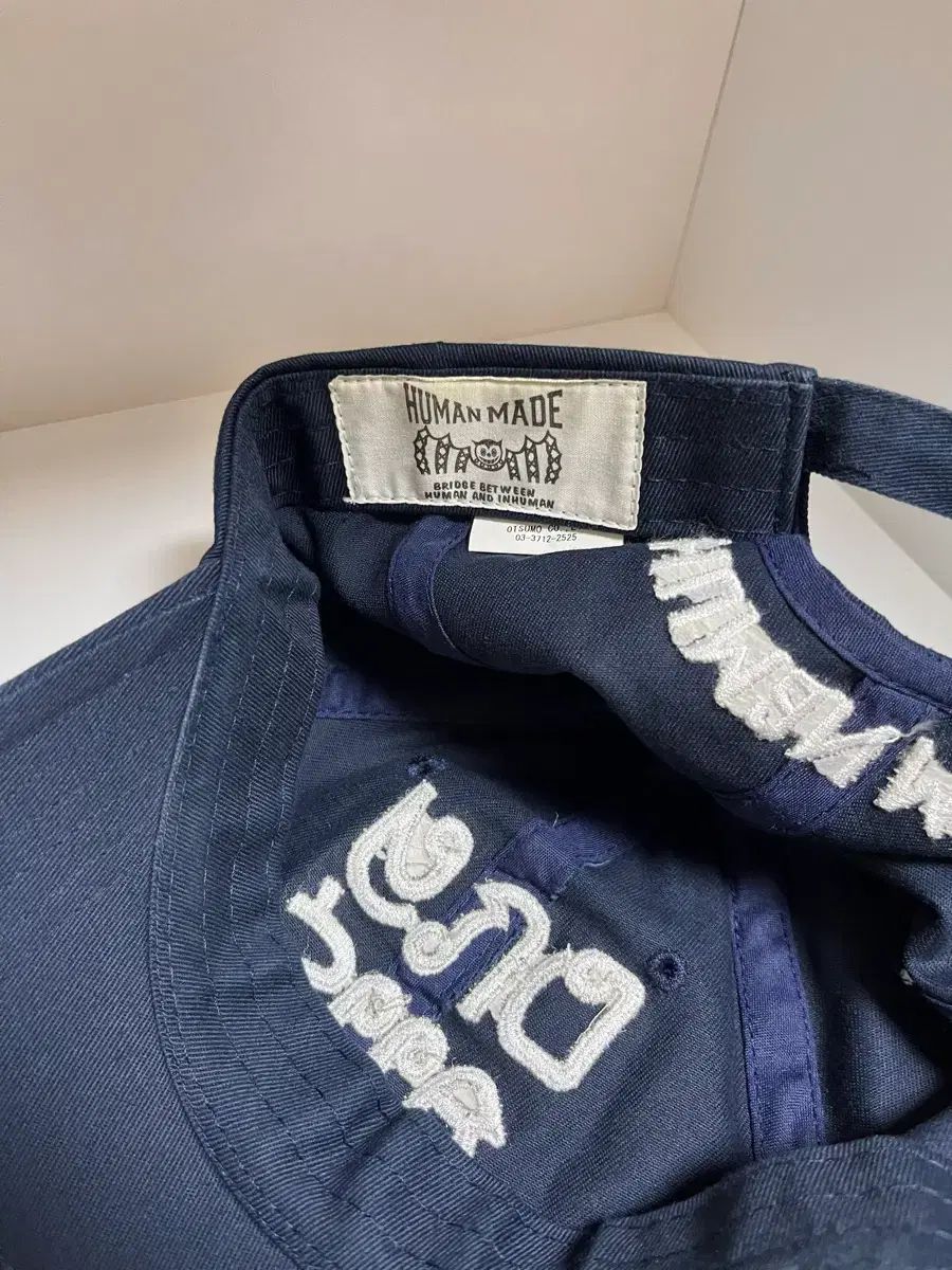 HUMAN MADE(ヒューマンメイド) ベースボールキャップ ネイビー - メルカリ