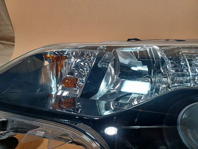 コーティング済 スペイド NCP145 左ヘッドランプ・ヘッドライト F 
