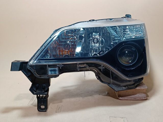 コーティング済 スペイド NCP145 左ヘッドランプ・ヘッドライト F 
