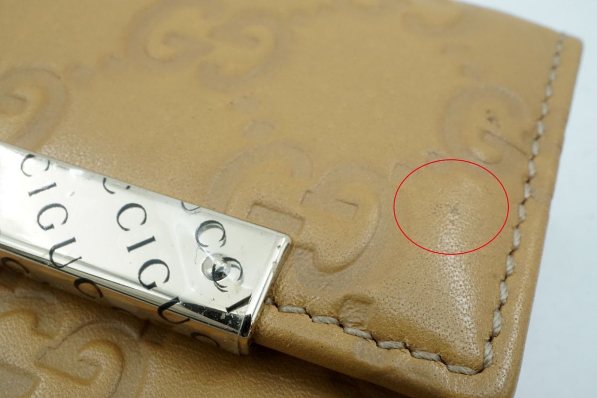 グッチ シマライン 二つ折り 財布 Wホック 型押しロゴ レザー