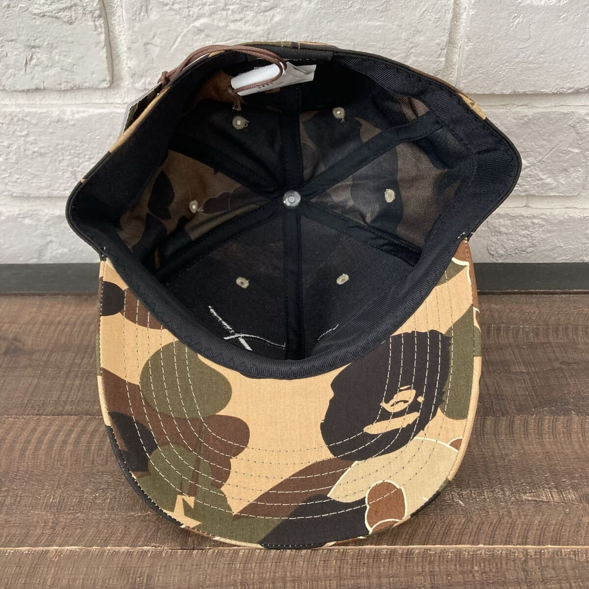 BAPE ×KAWSコラボ迷彩柄 キャップ BAPE ×KAWSコラボ迷彩柄 キャップ A Bathing ape アベイシングエイプ