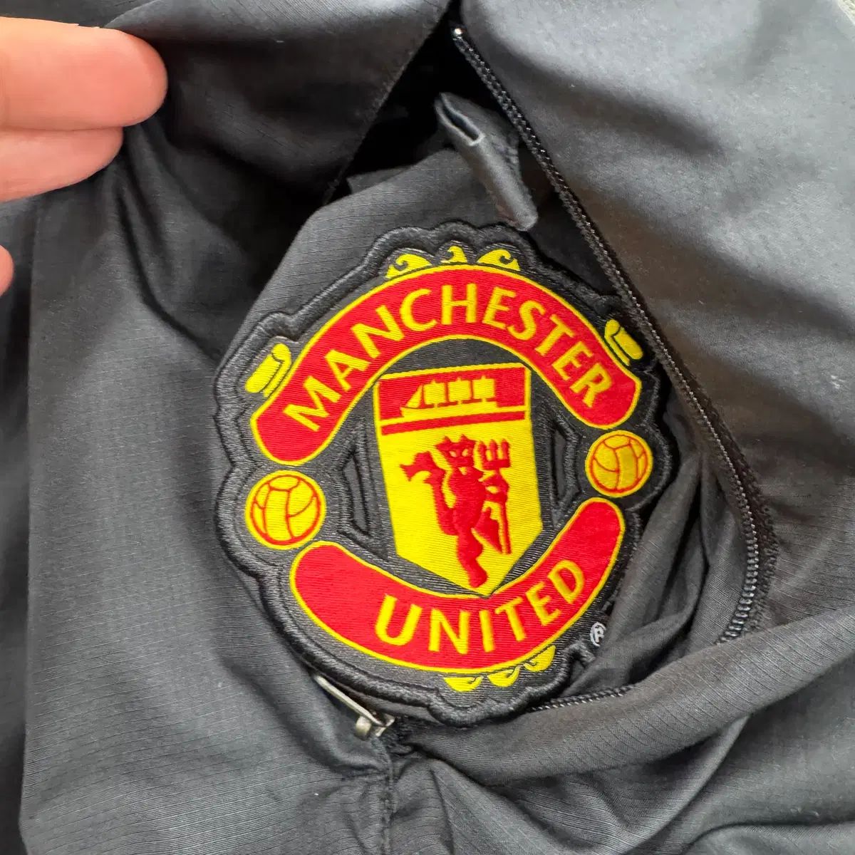 M NIKE マンチェスターユナイテッド STORM-FIT ウィンドブレーカー