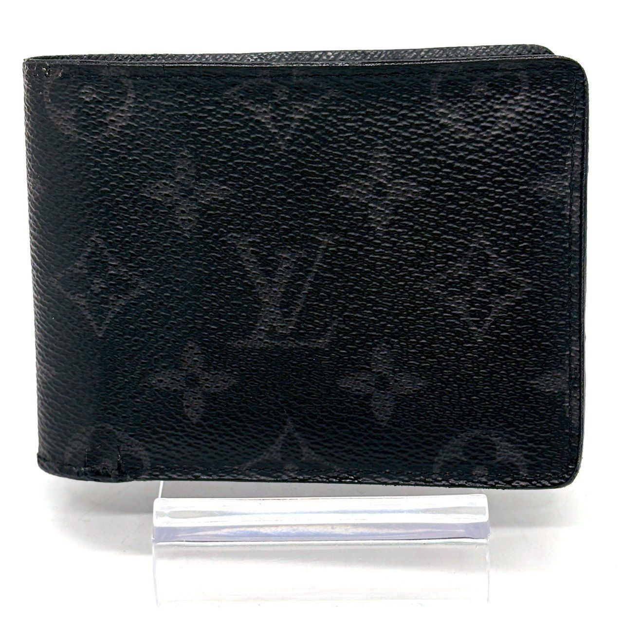 黒で選ぶ、仕事の品格】 LOUIS VUITTON 二つ折り財布 モノグラム