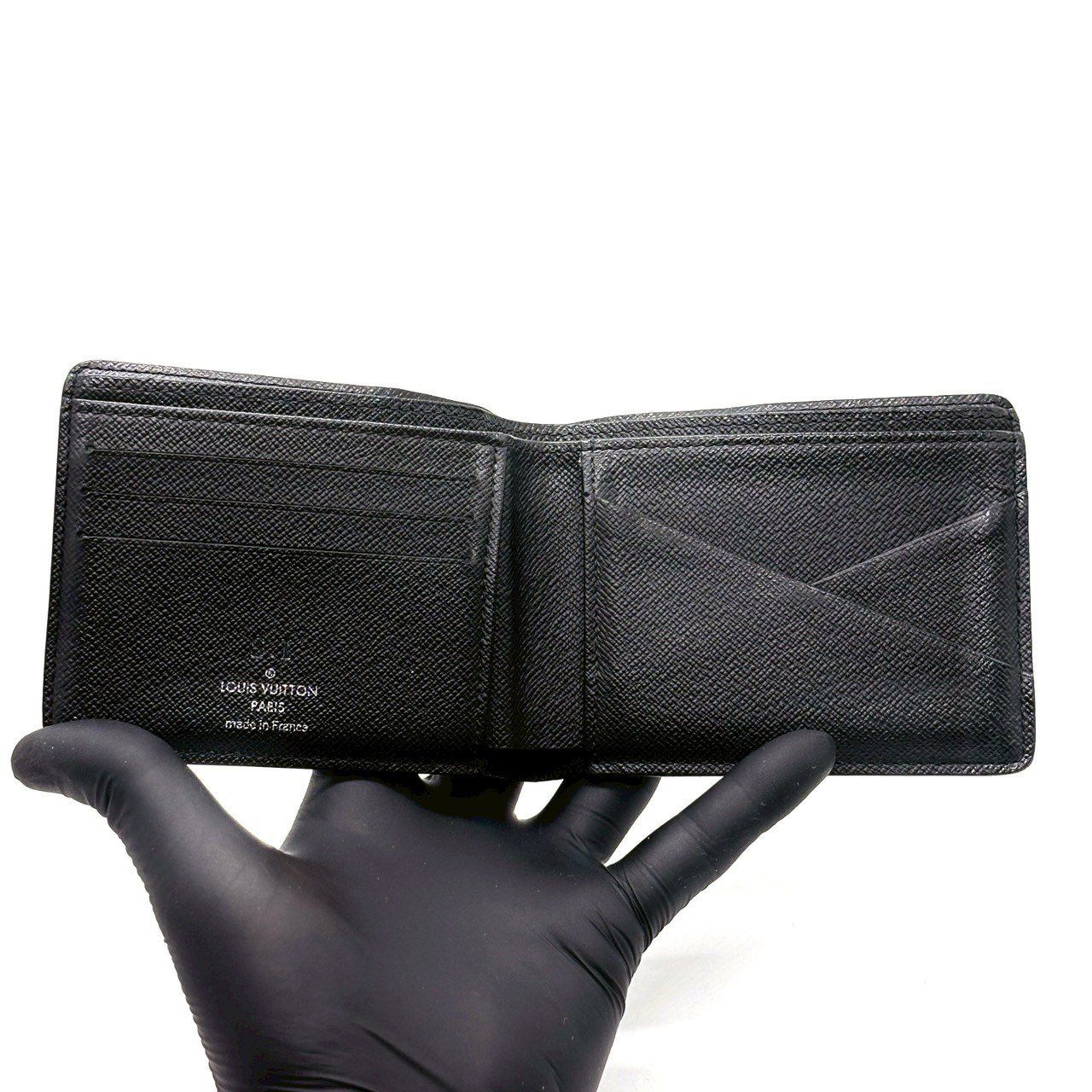 黒で選ぶ、仕事の品格】 LOUIS VUITTON 二つ折り財布 モノグラム