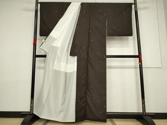 平和屋着物○本場大島紬 経緯絣 泥染め 地空き 丸文 飛び柄 関絹織物