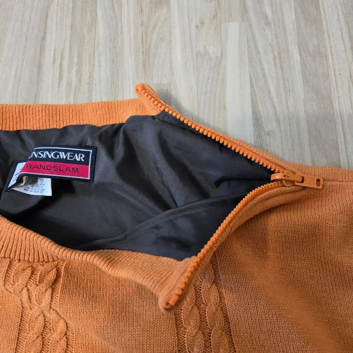 レディース90) MUNSINGWEAR マンシングウェア オレンジ色 ゴルフ 防風