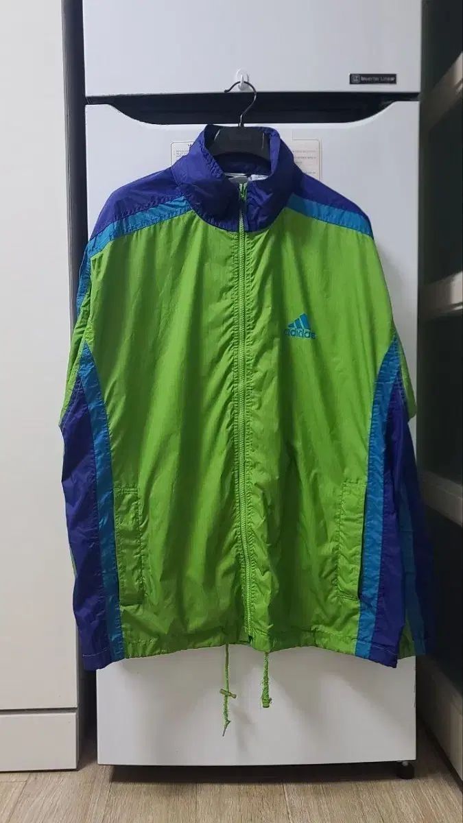 アディダス ウィンドブレーカー グリーン/ブルー - メルカリ