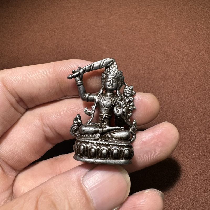 チベットの仏像、文殊菩薩、小さな仏像、顔、謎めいた、手持ちの置物