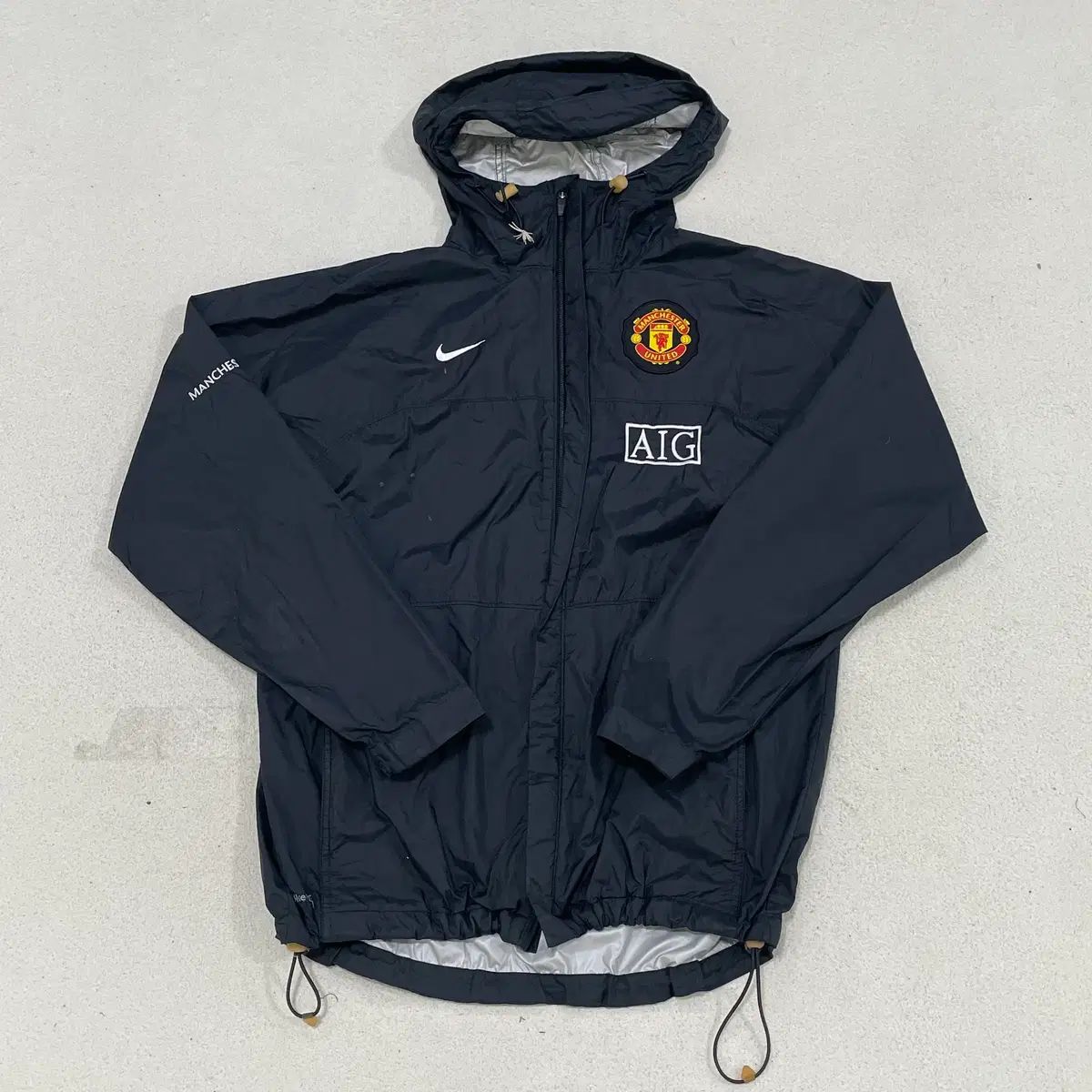 M NIKE マンチェスター・ユナイテッド AIG ウィンドブレーカー