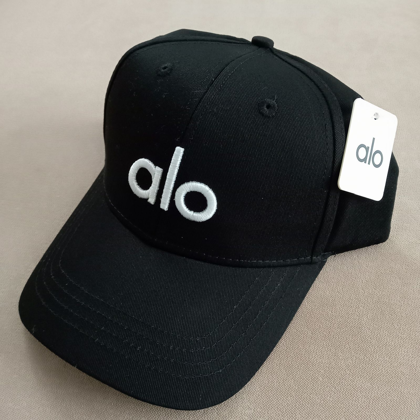 alo 黒 ベースボールキャップ 男女兼用 - メルカリ