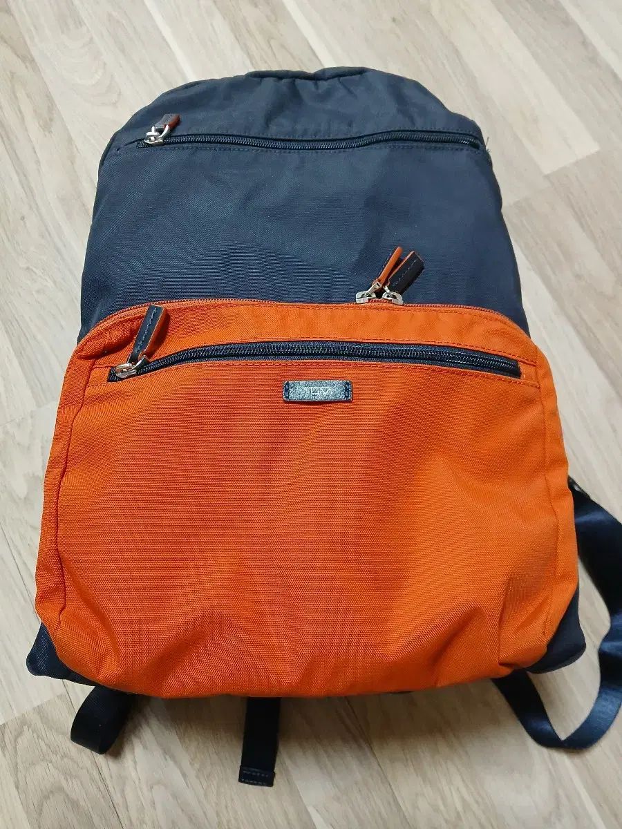 TUMI ステンレスボトル バックパック ネイビー オレンジ