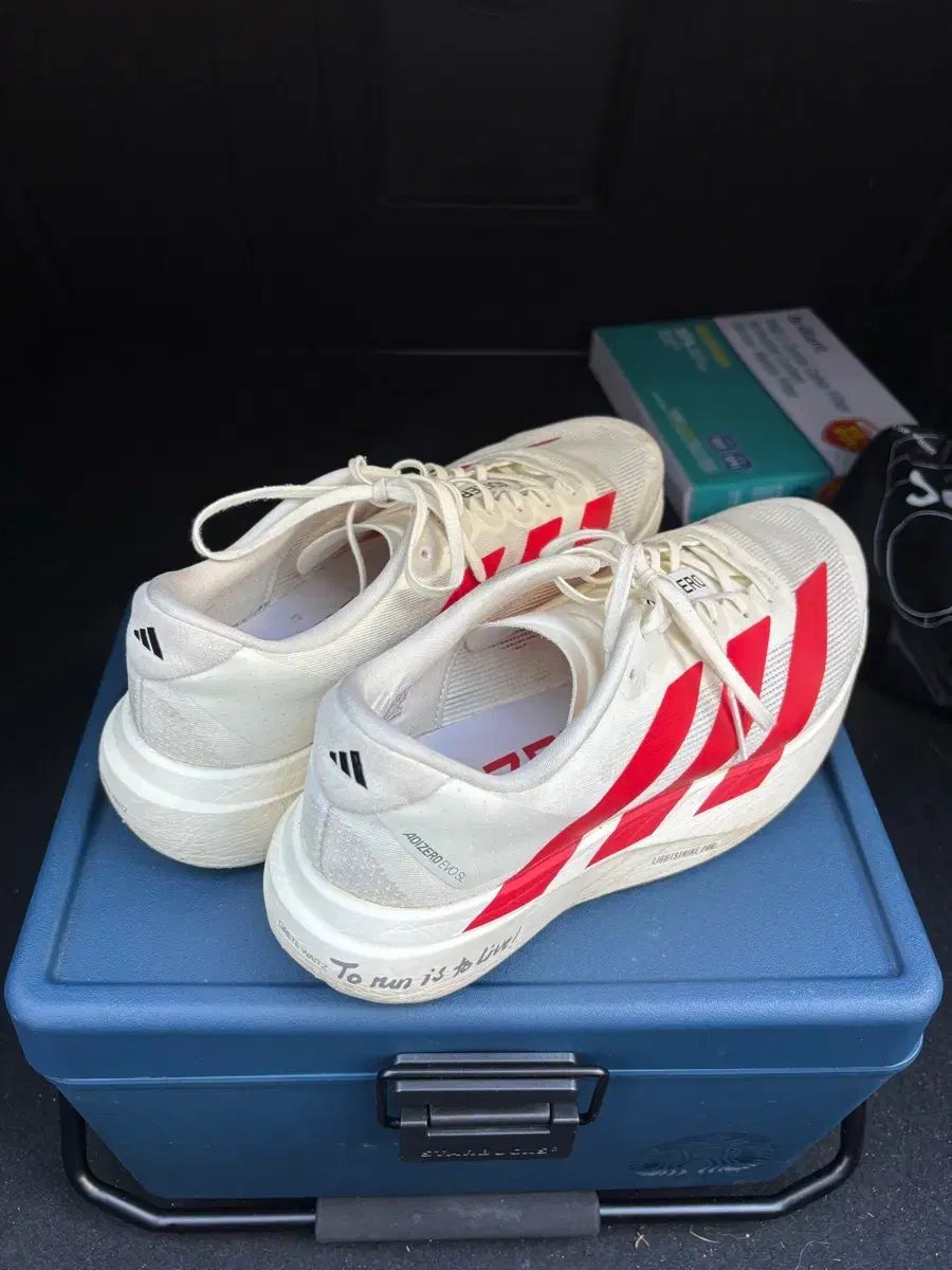 アディダス アディゼロ EVO SL オフホワイト ベター スカーレット