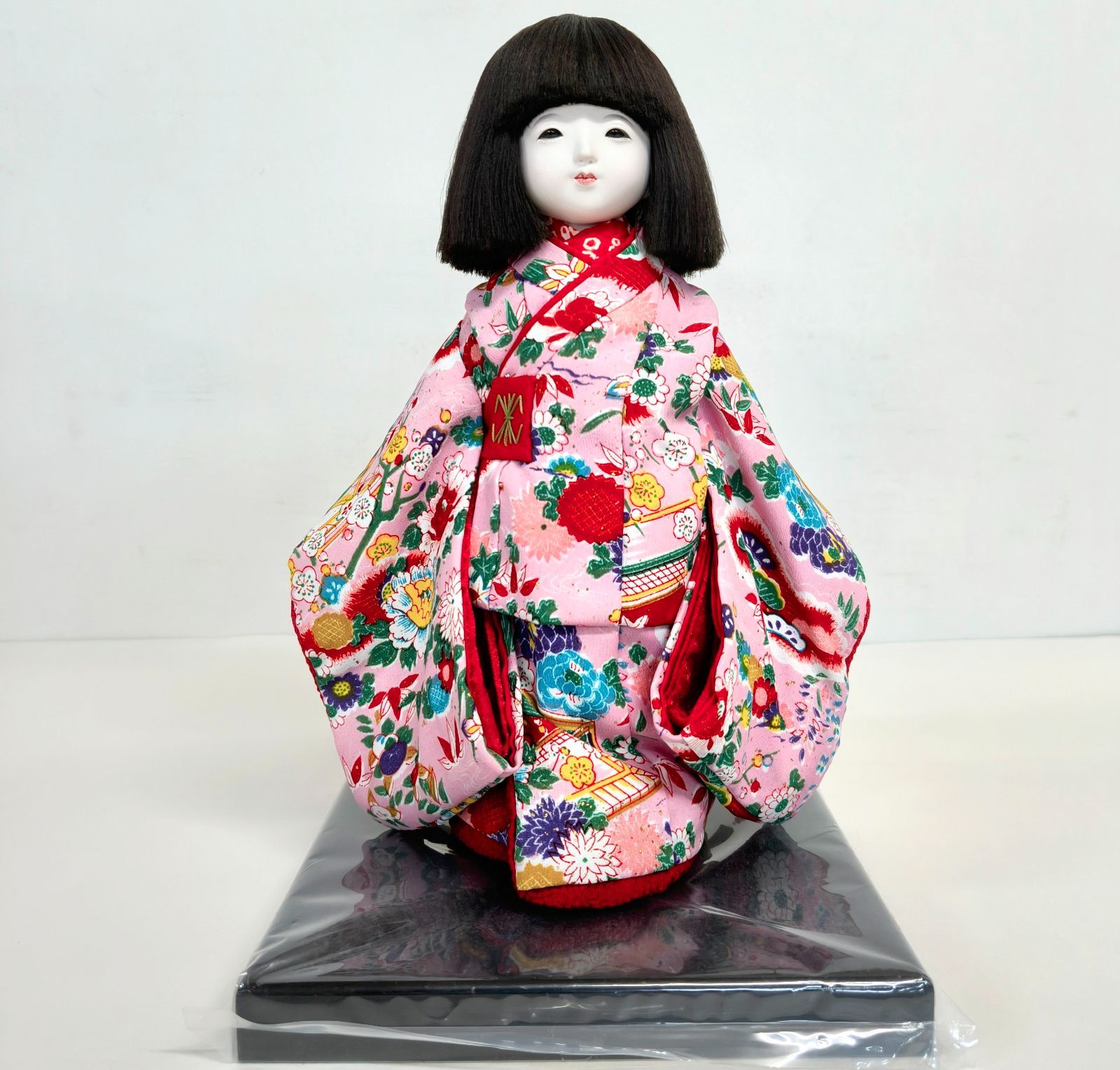 市松人形 女の子 久楽朋 縮緬ピンク 荘園の四季花 - メルカリ