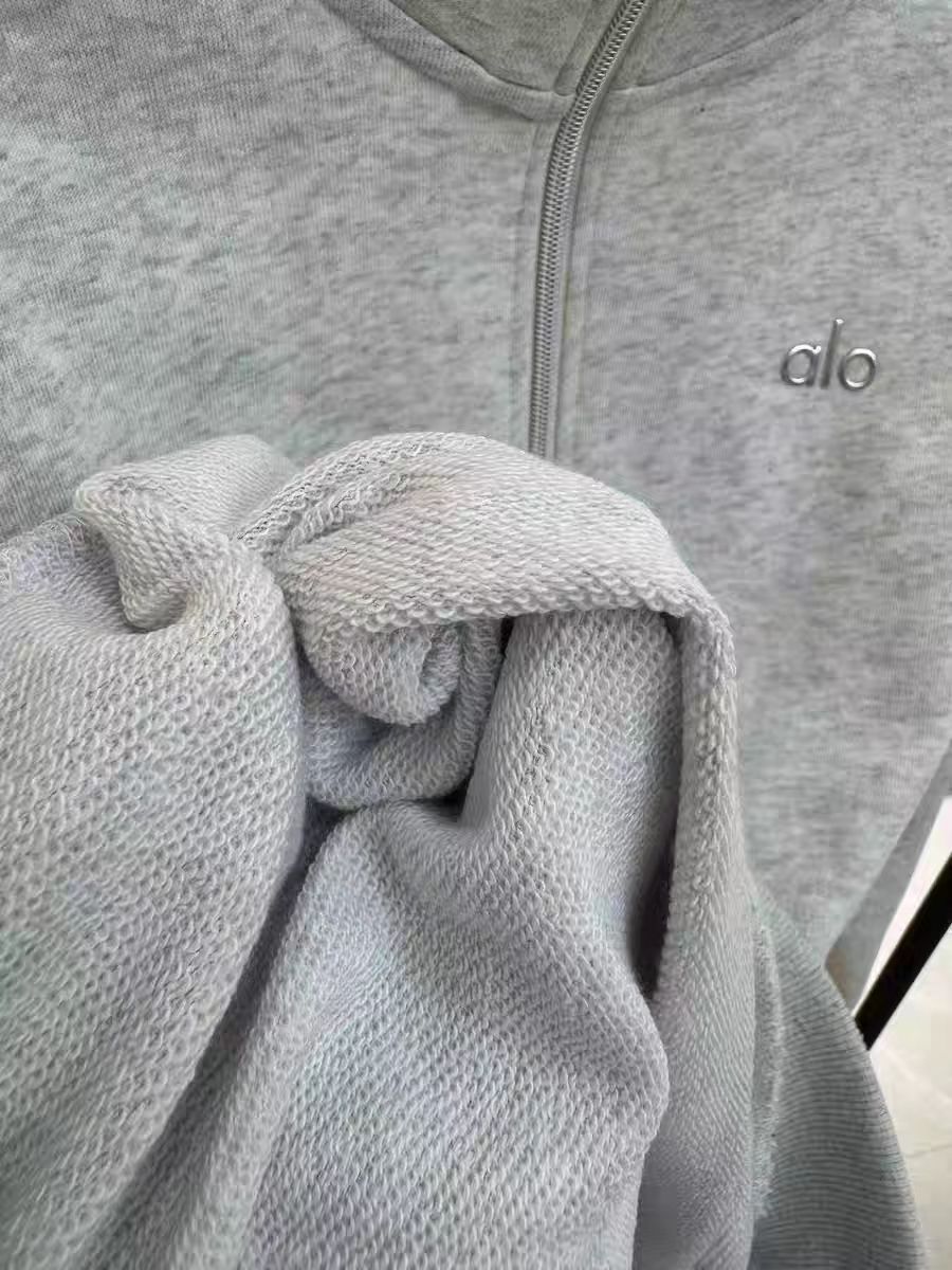 ALO ジップアップスウェット ブラック ミニマルデザイン - メルカリ