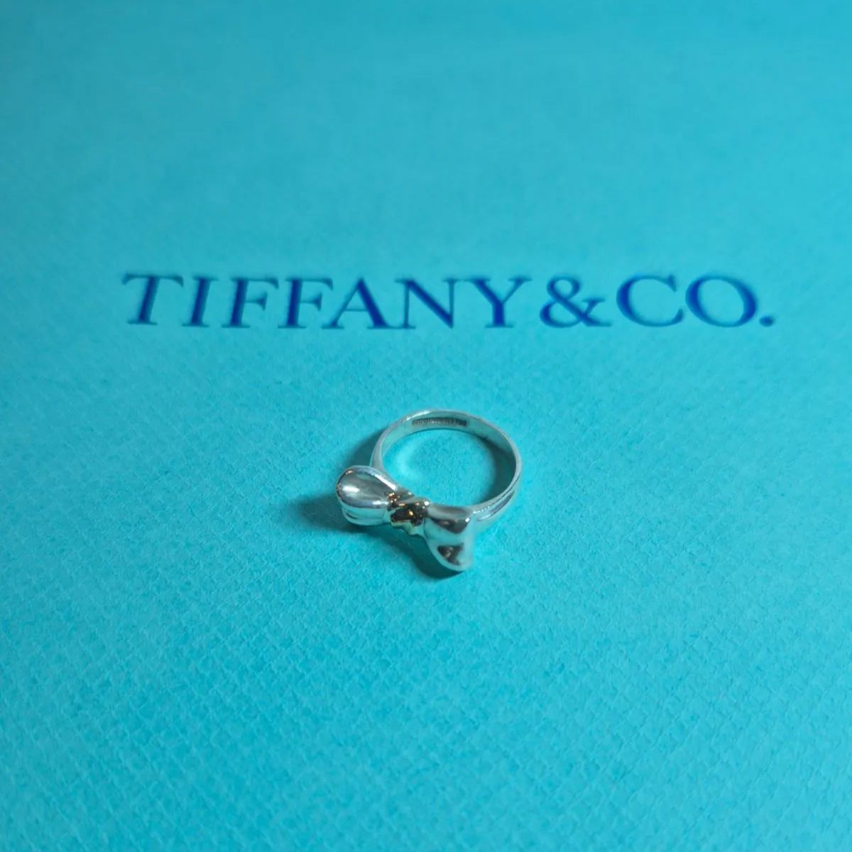 ティファニー リボン リング SV925 750 K18 7号 リボンリング - メルカリ