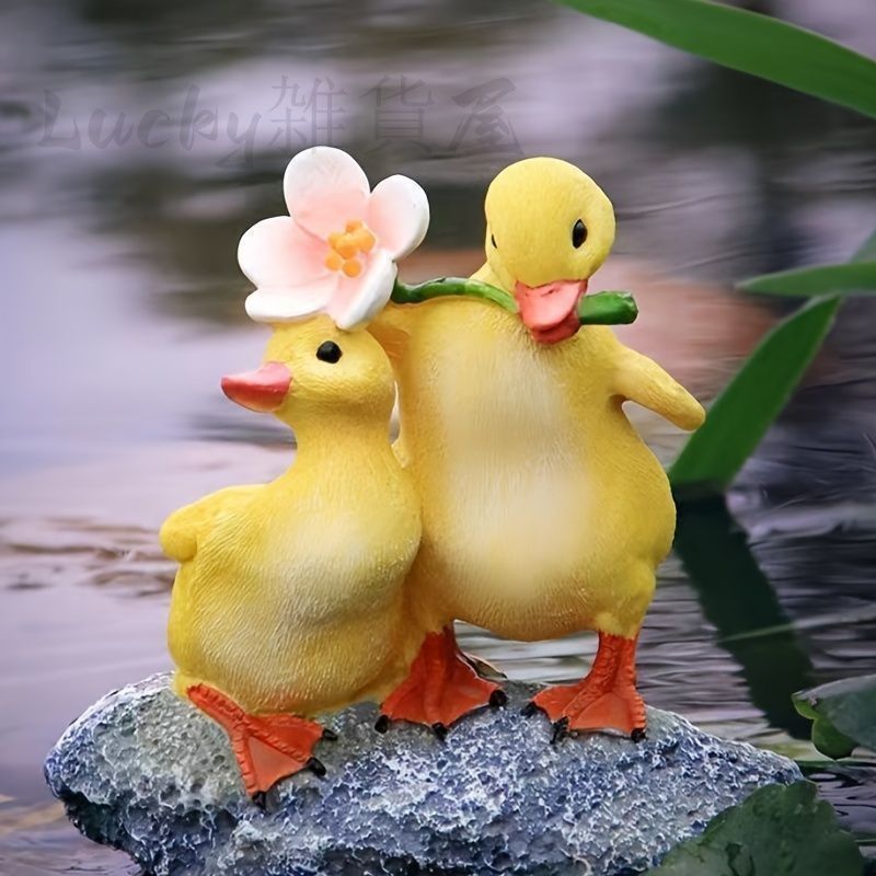 置物 オブジェ あひる アヒルの子供 花を咥えているアヒル 室内 屋外