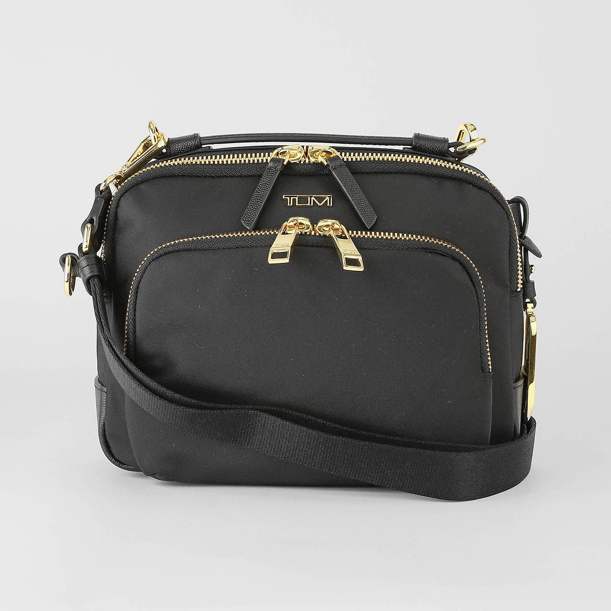 新品 トゥミ TUMI ショルダーバッグ ヴォヤジュール ブラック/ゴールド 