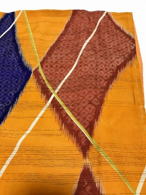 中古】紬 正絹 萱草色地に菱文様 アンティーク 裄61cm Sサイズ 袷着物