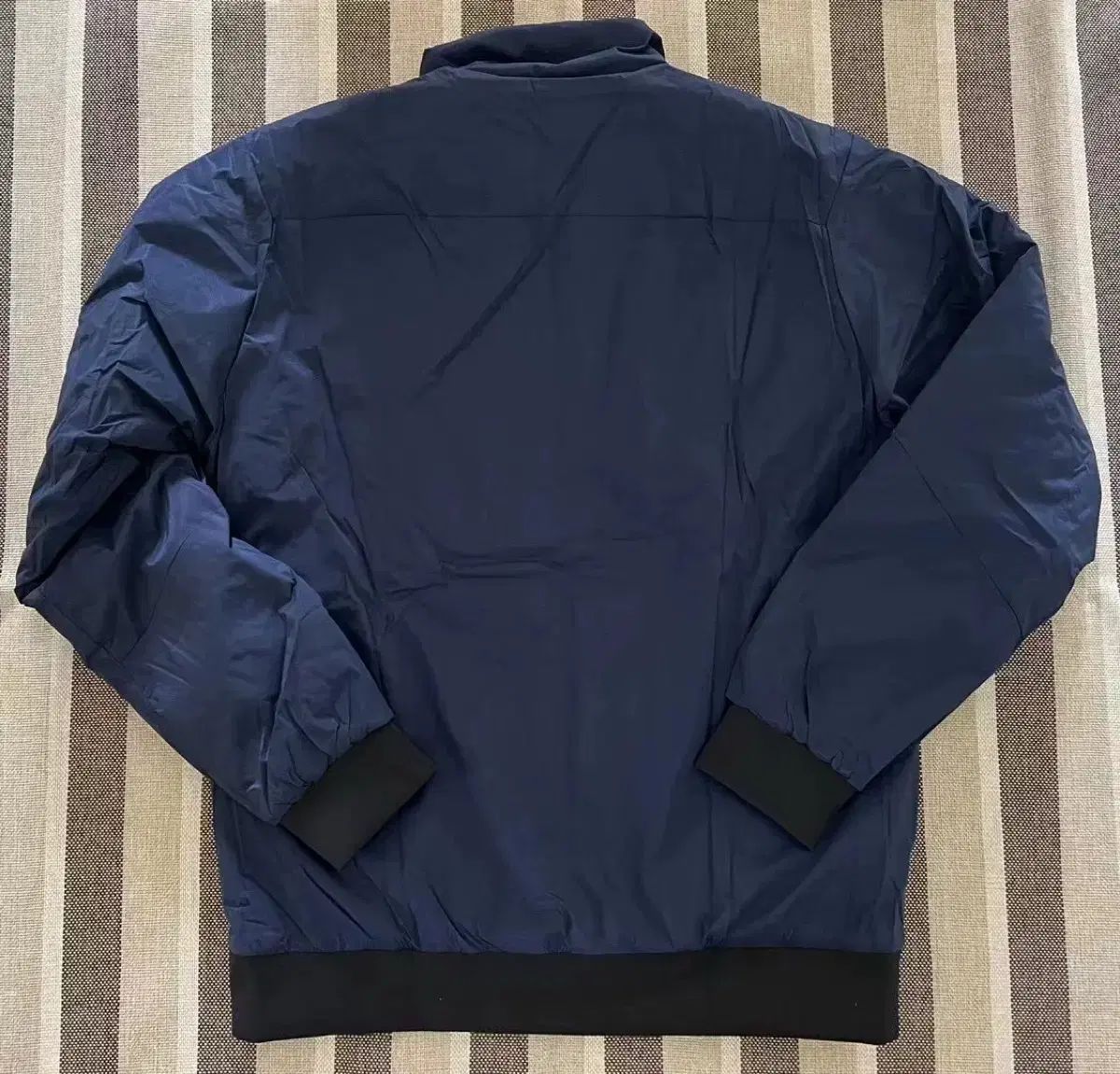 日本ハムファイターズ選手団支給品オークリー ダウン アウター - メルカリ