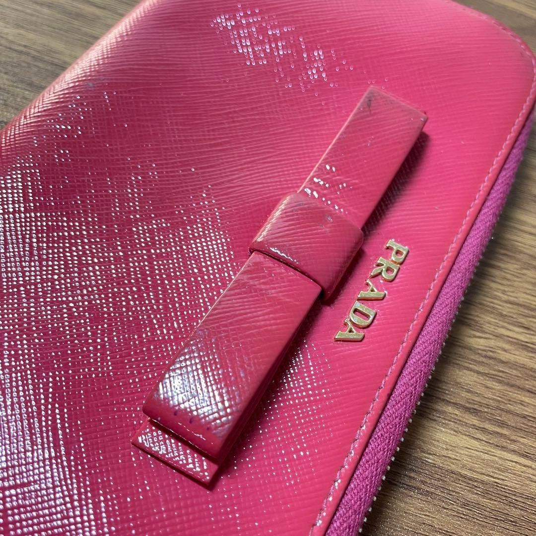 美品】PRADA サフィアーノ リボン 長財布 ピンク 正規品 - メルカリ