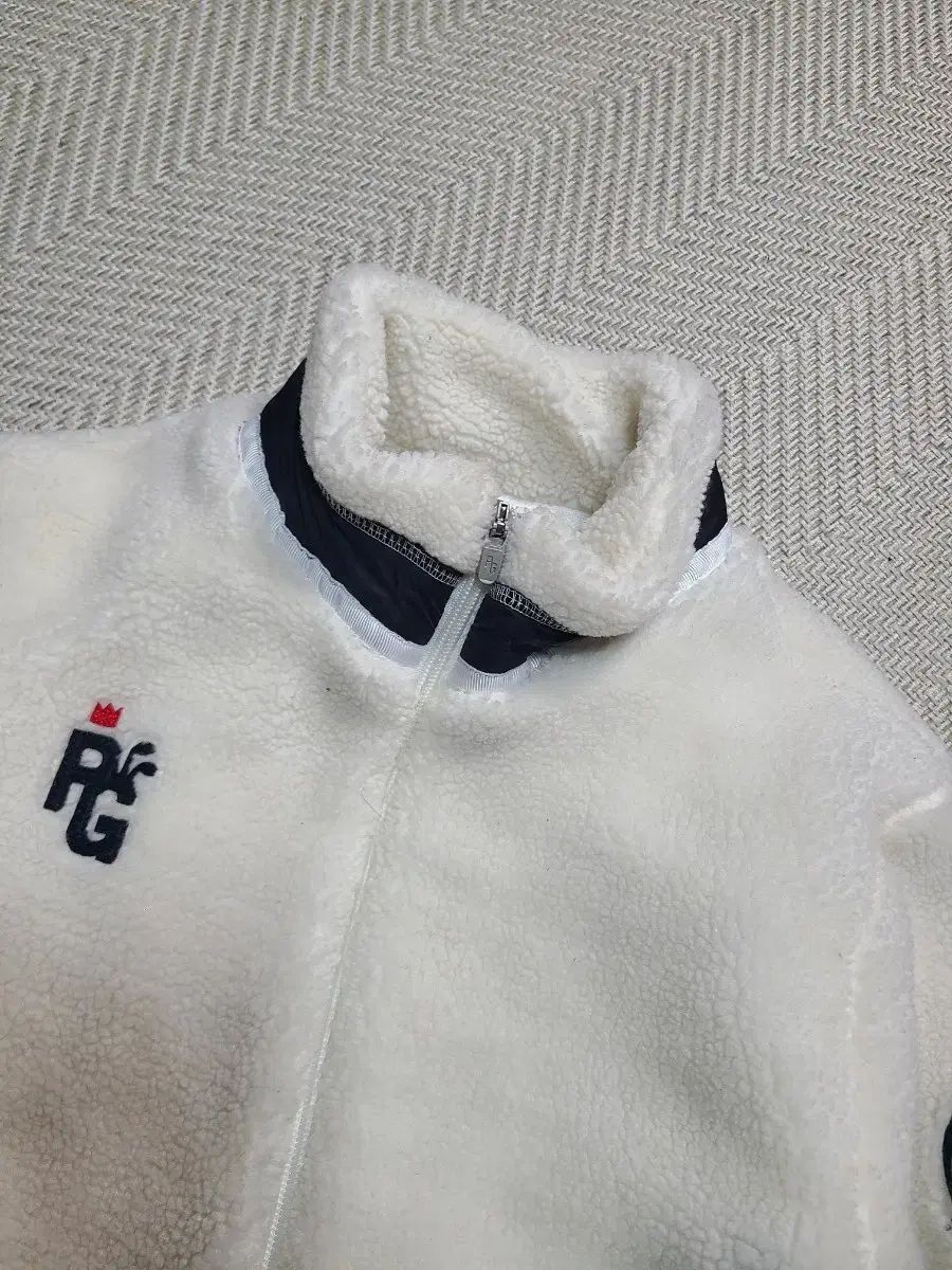 0)パーリーゲイツ ボア フリース ジャケット アイボリー - メルカリ