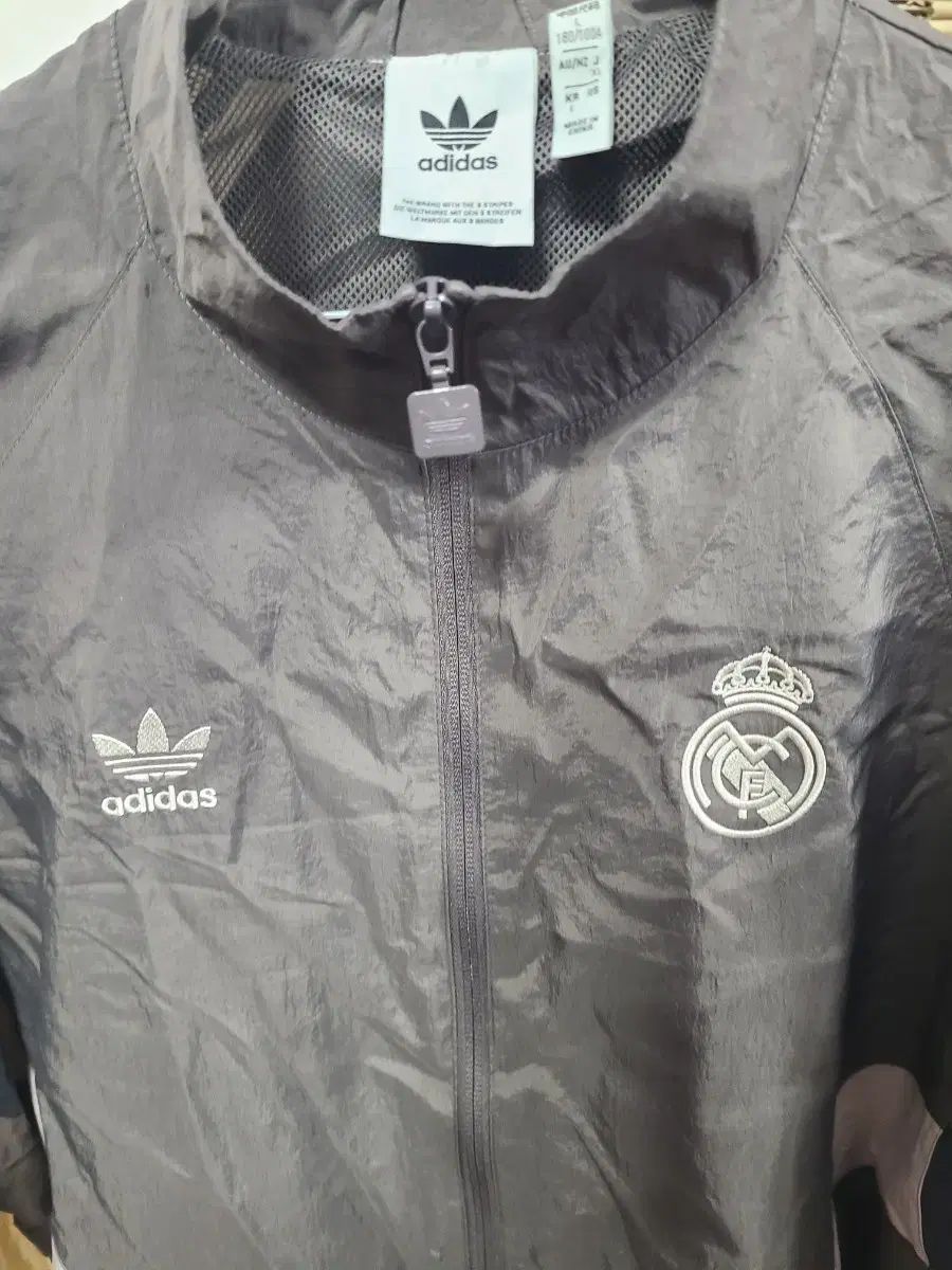 adidas レアル・マドリード ウィンドブレーカー グレー 新モデル アディダス レアルマドリード 炎 ウィンドブレーカー L