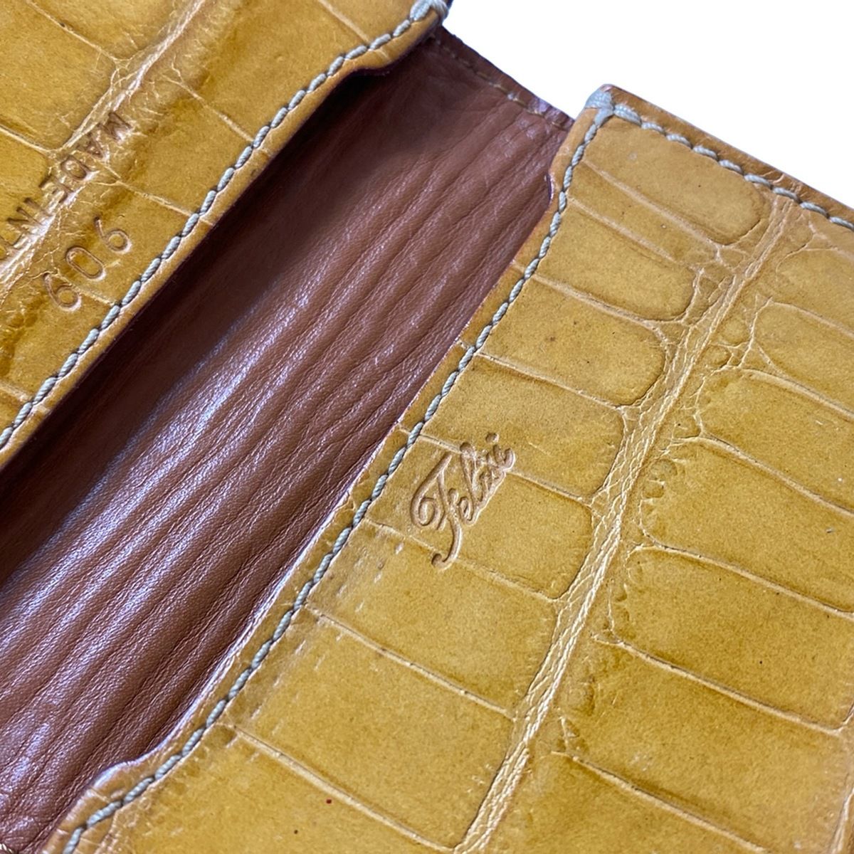 Felisi(フェリージ) 名刺入れ - 909 ダークイエロー 型押し加工 レザー