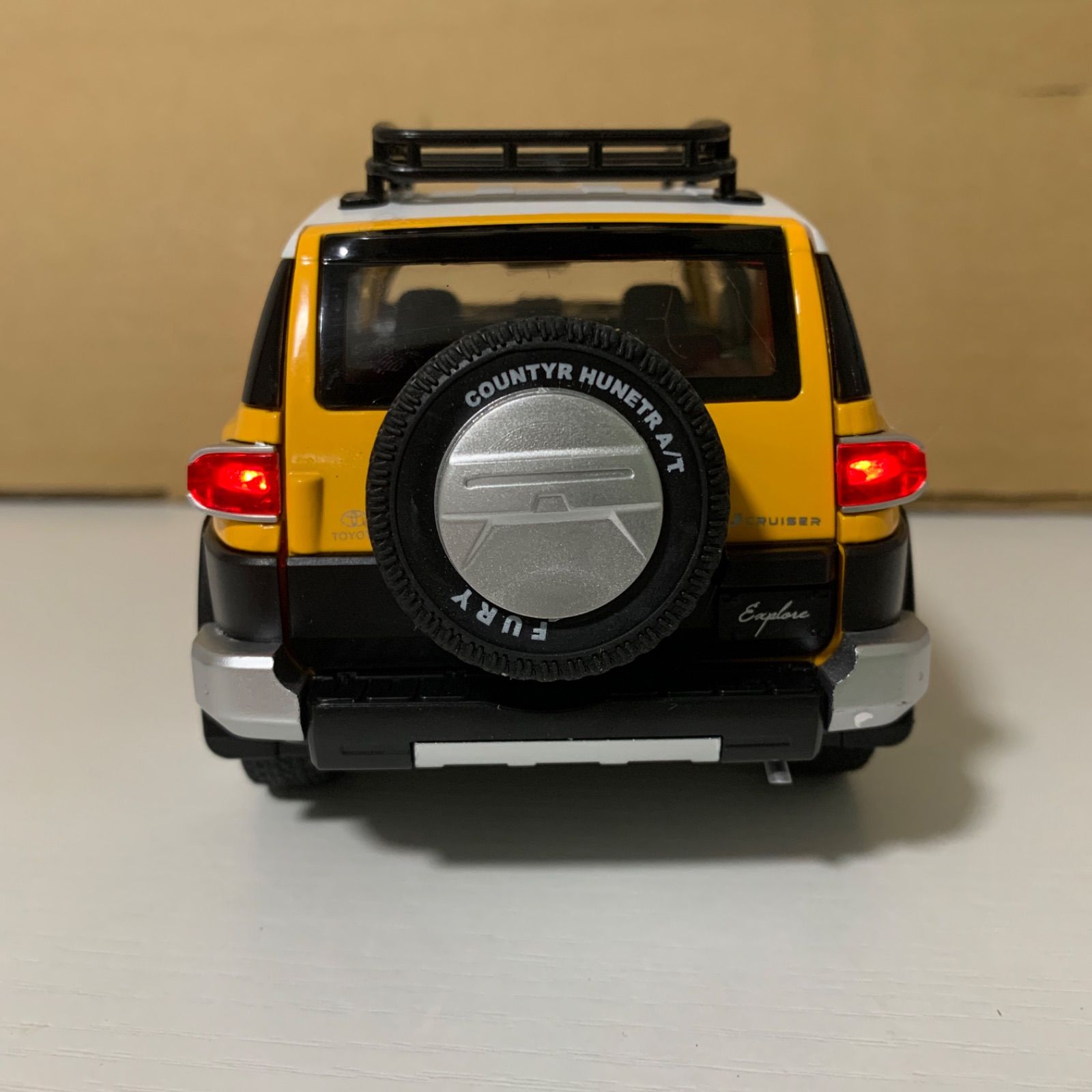 トヨタ FJクルーザー ダイキャスト 1/24 ミニカー 黄色 - メルカリ