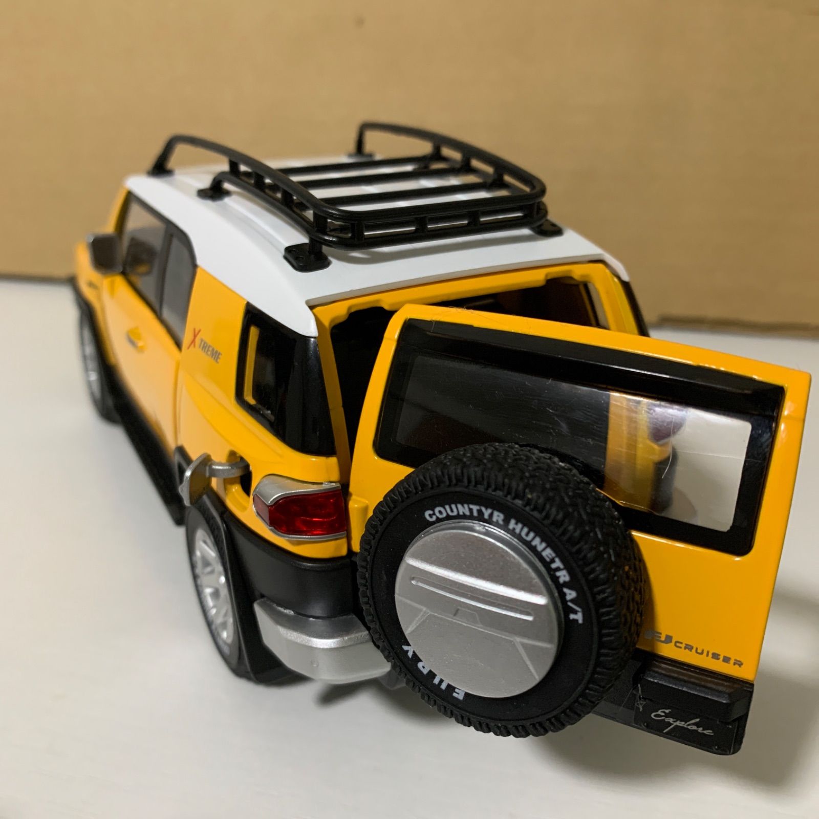 トヨタ FJクルーザー ダイキャスト 1/24 ミニカー 黄色 - メルカリ