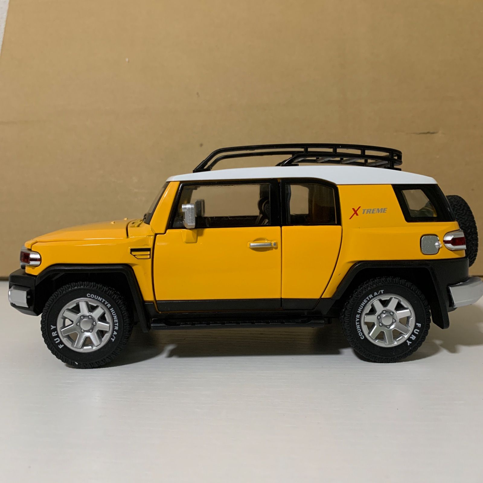 トヨタ FJクルーザー ダイキャスト 1/24 ミニカー 黄色 - メルカリ