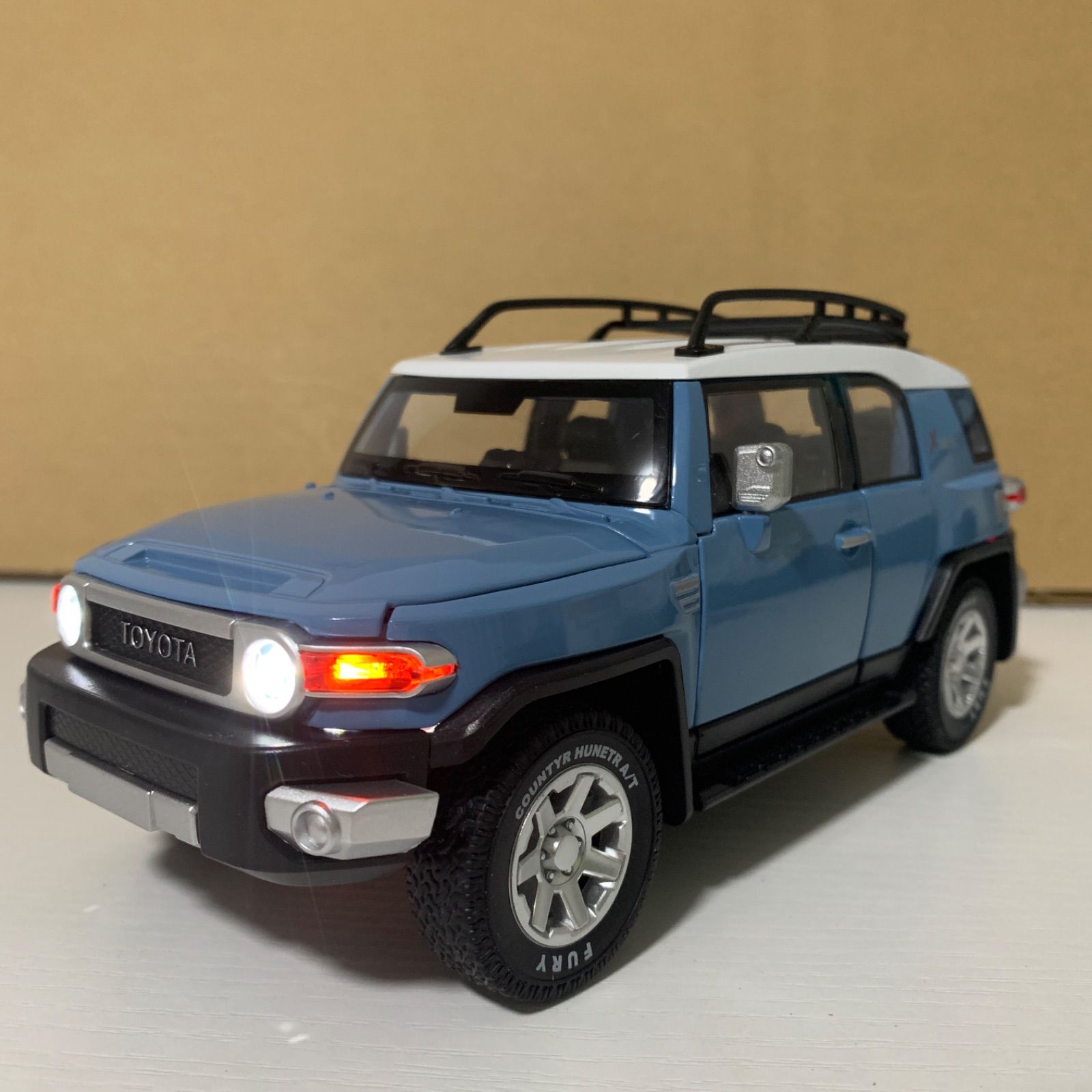 トヨタ FJクルーザー ダイキャスト 1/24 ミニカー 青 - メルカリ