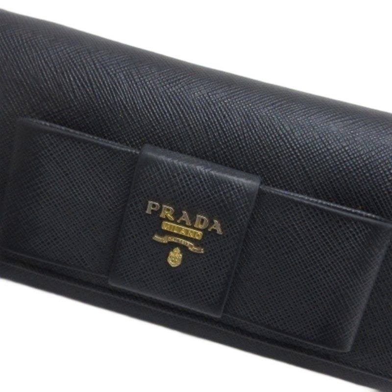 プラダ PRADA サフィアーノレザー ロゴ 長財布 リボン ブラック - メルカリ