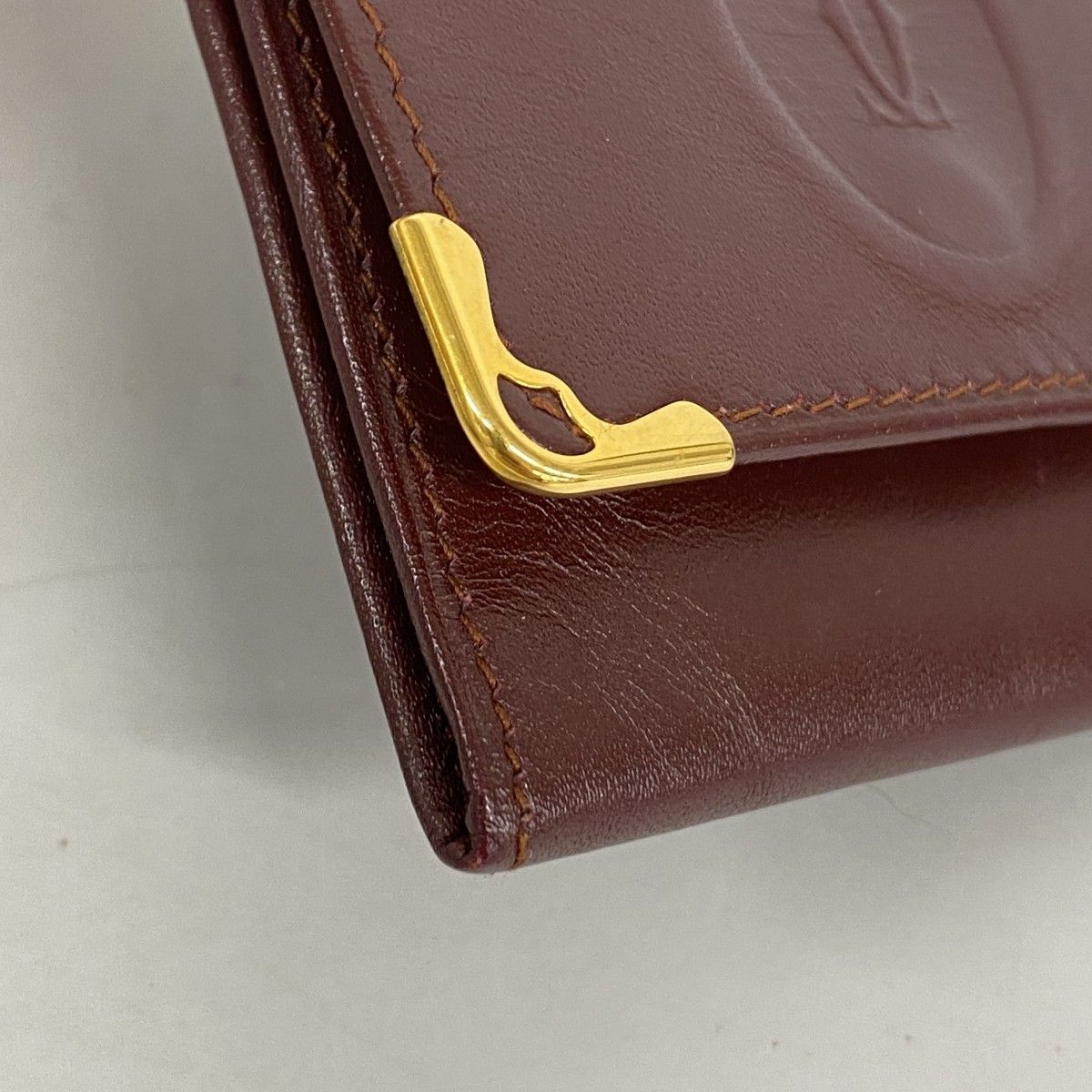 6ad3899】カルティエ コインケース マスト レザー ボルドー ゴールド