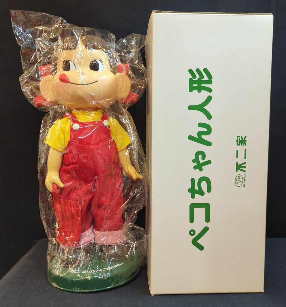不二家 首振り人形 おつかいペコちゃん 赤いバッグ持ち - メルカリ