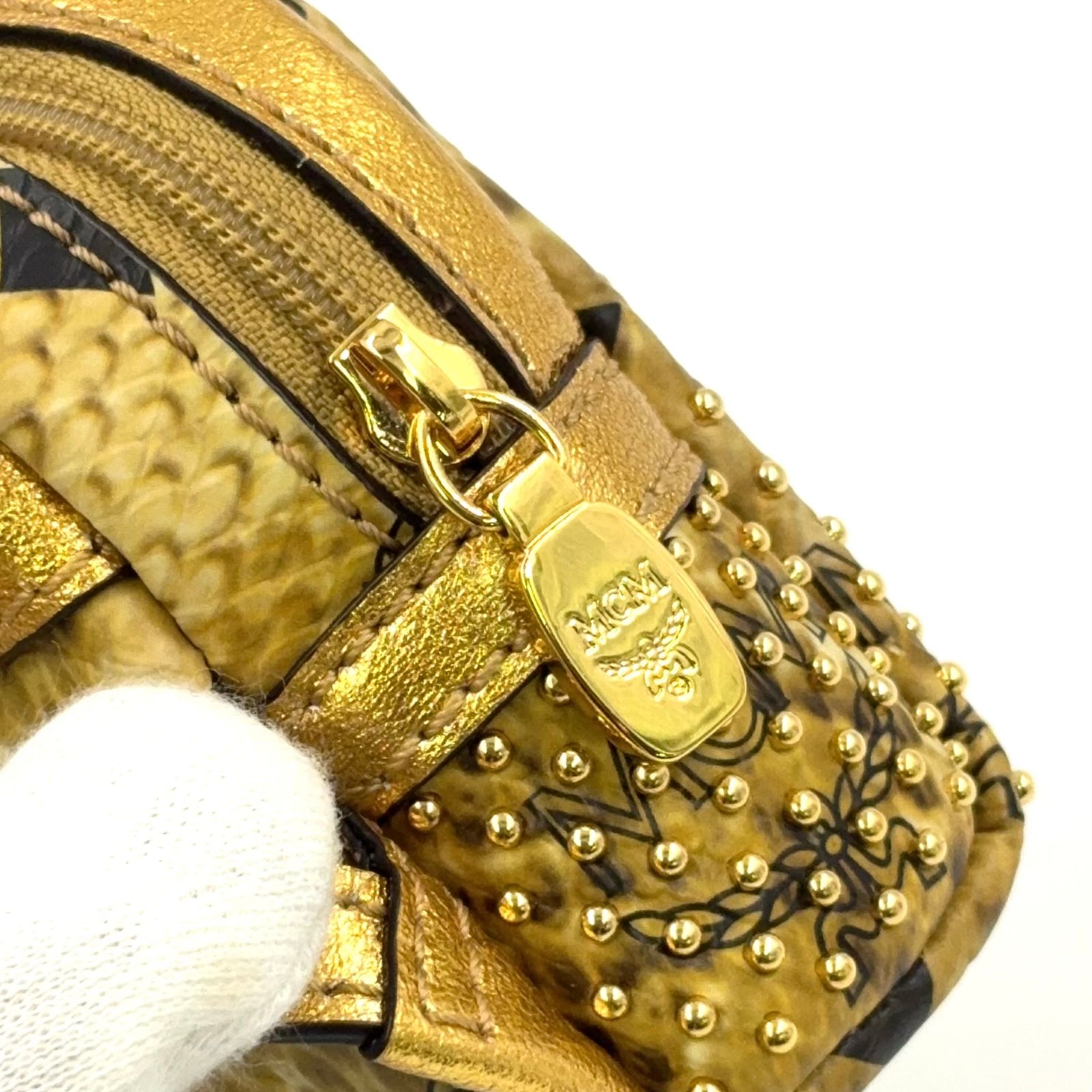 MCM バックパック型 ミニポーチ PVC ゴールド チャーム ゴールド