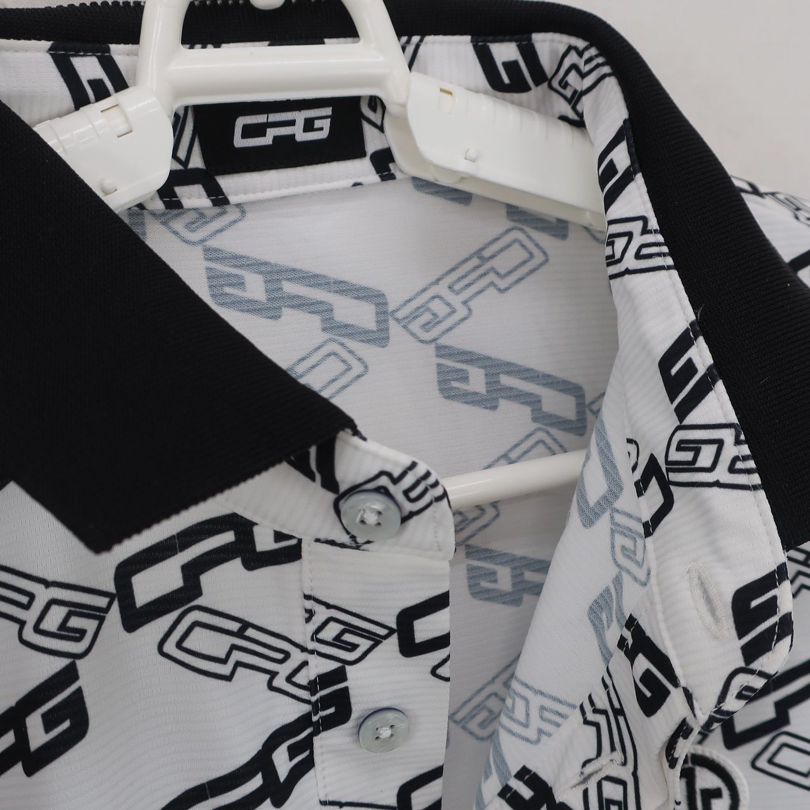 CPG GOLF(シーピージーゴルフ) ポロシャツ 白黒ロゴ総柄 メンズ 3 2109