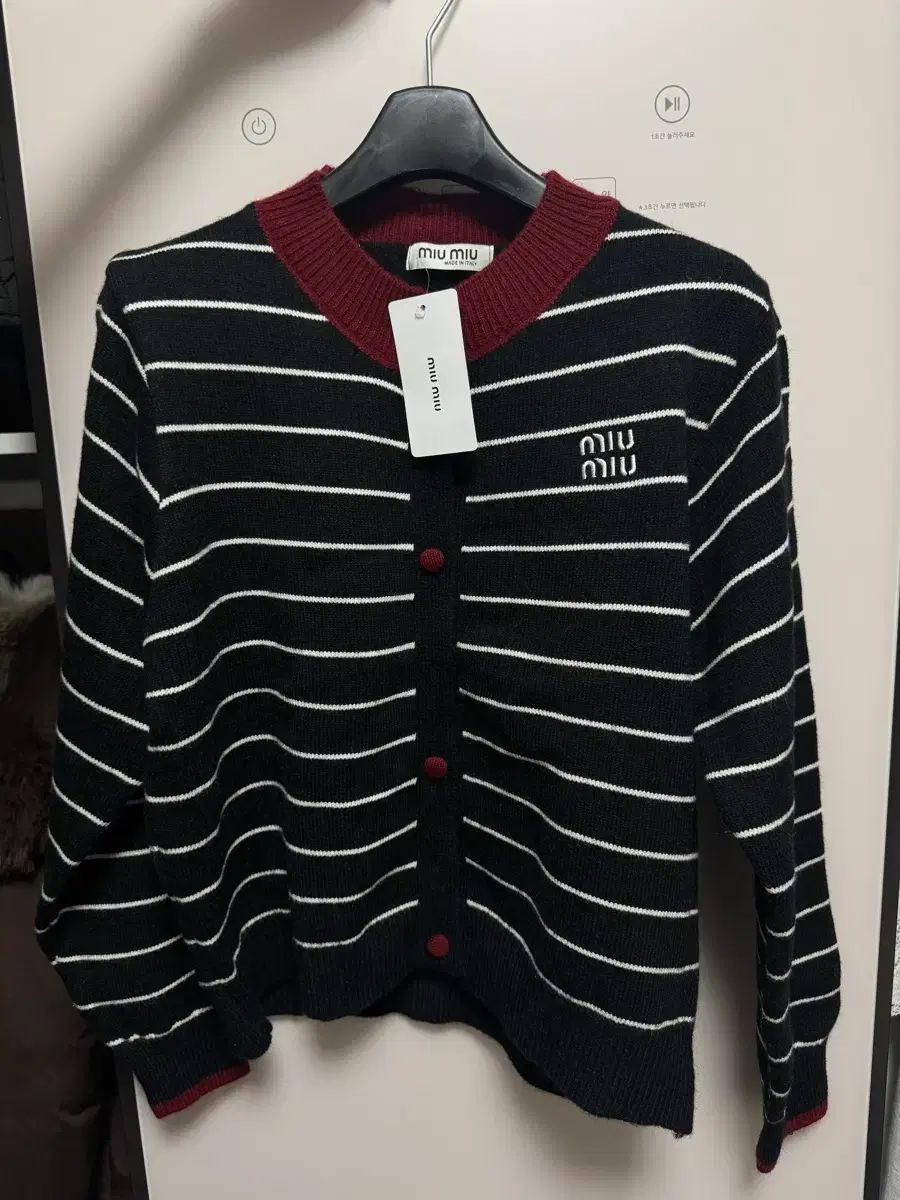 ミュウミュウ カーディガン - メルカリ