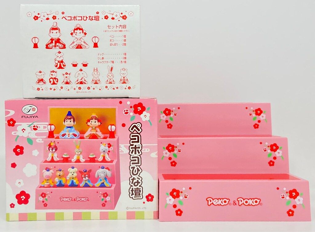 不二家 人形/ペコちゃん ペコポコひな壇 三段 - メルカリ