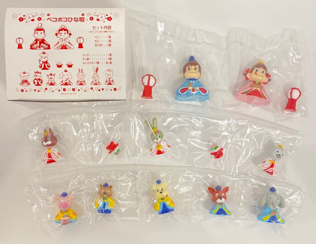 不二家 人形/ペコちゃん ペコポコひな壇 三段 - メルカリ