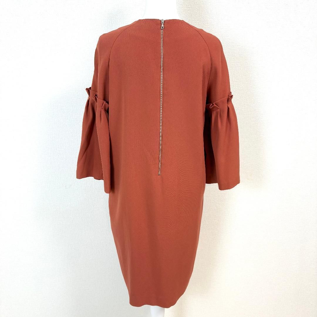 美品】 ADORE 長袖ワンピース 袖フレア 38 オレンジ 無地 - メルカリ