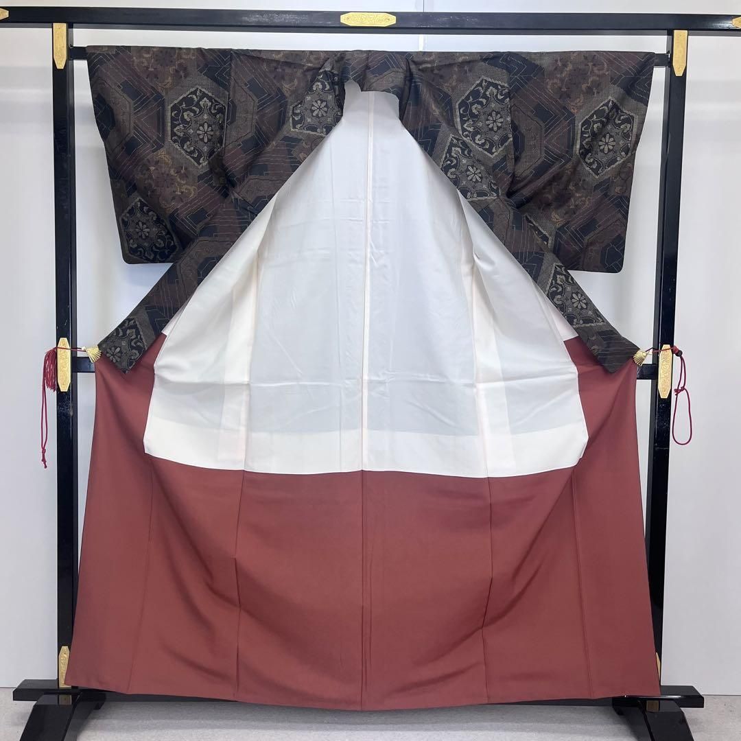 本場大島紬 一元 5マルキ 亀甲に華柄模様 K-4054 本場大島紬 一元 5マルキ 亀甲に華柄模様 K-4054 - メルカリ