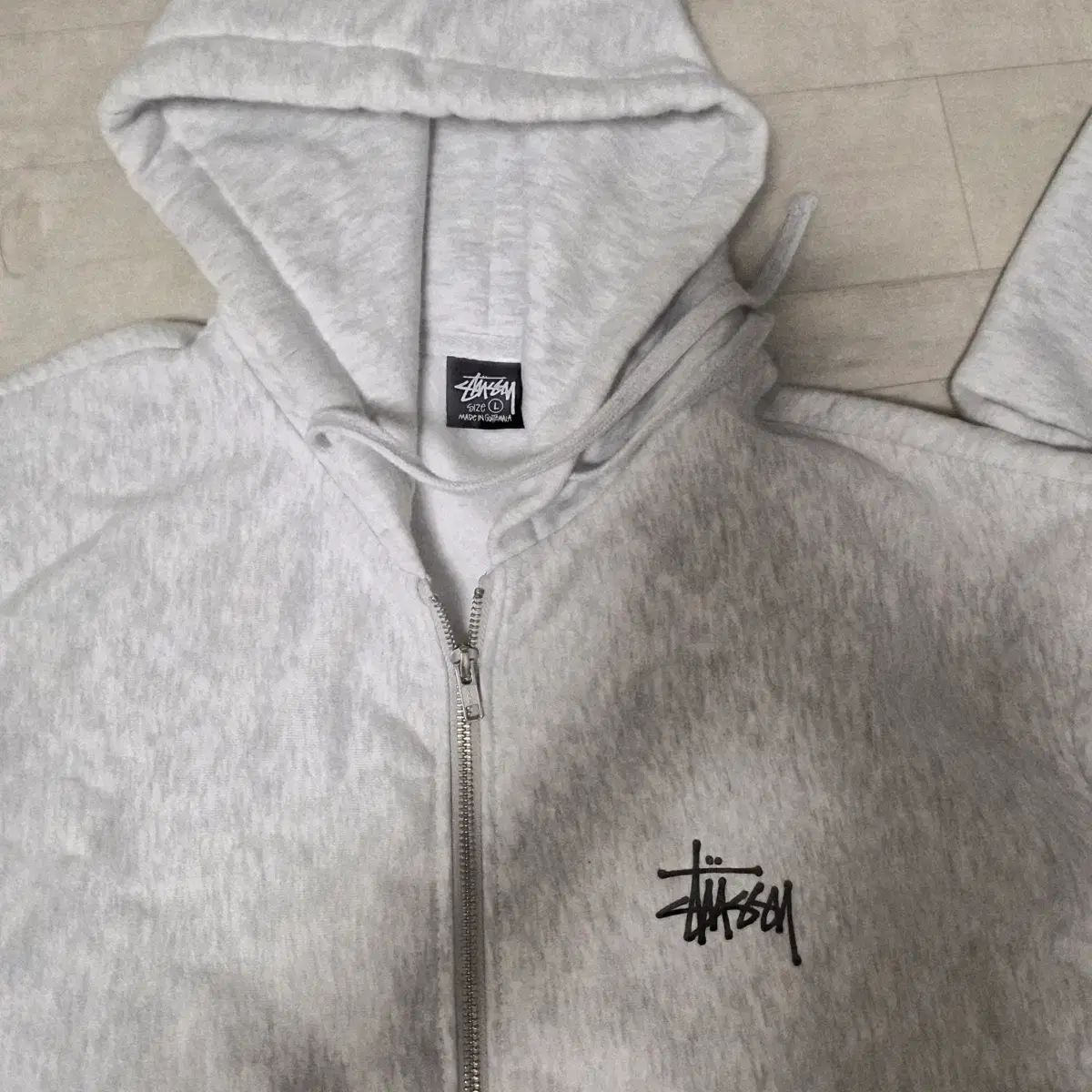 STUSSY グレー フードジップアップ L - メルカリ