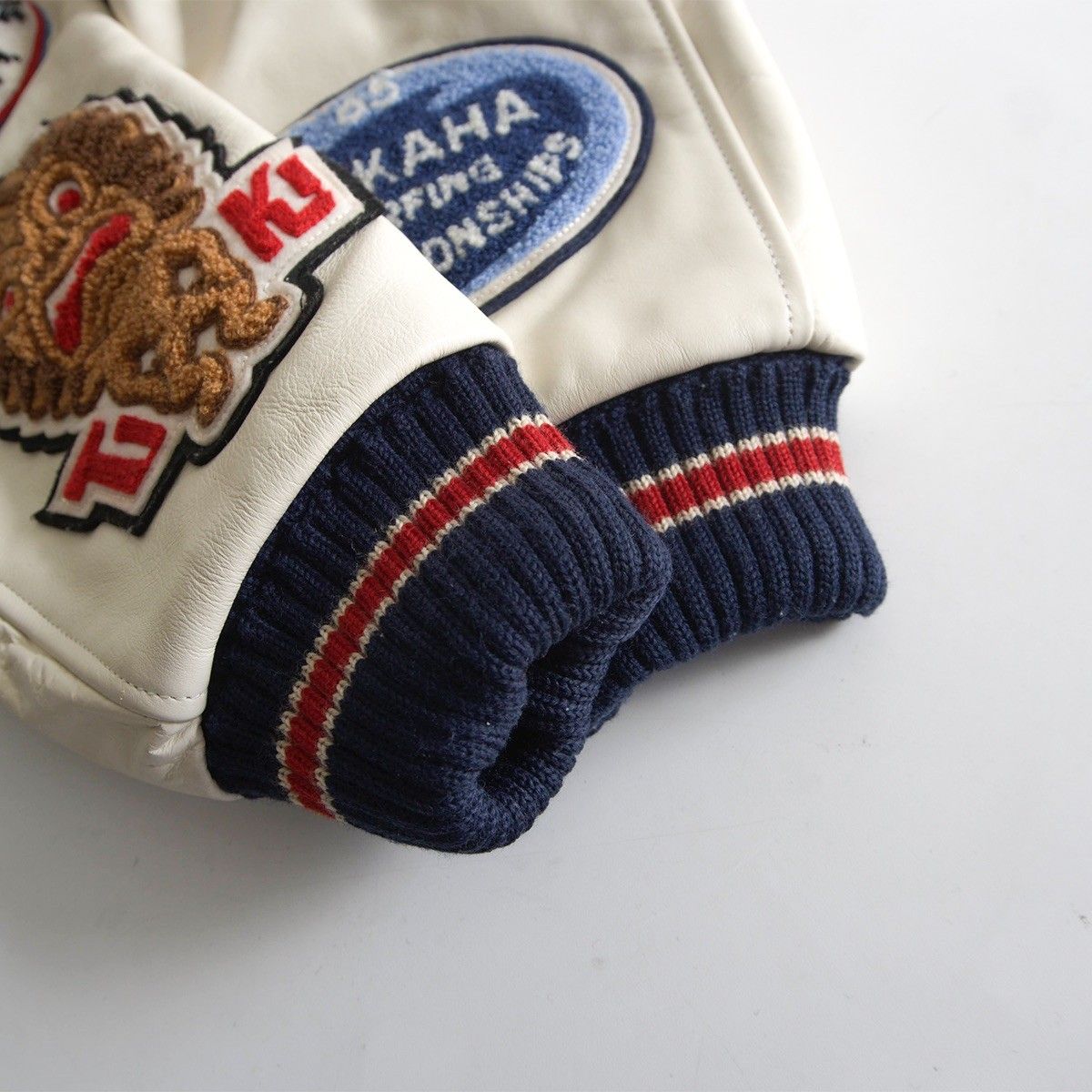 美品】WHITESVILLE【フルデコ レザースリーブ スタジャン】38